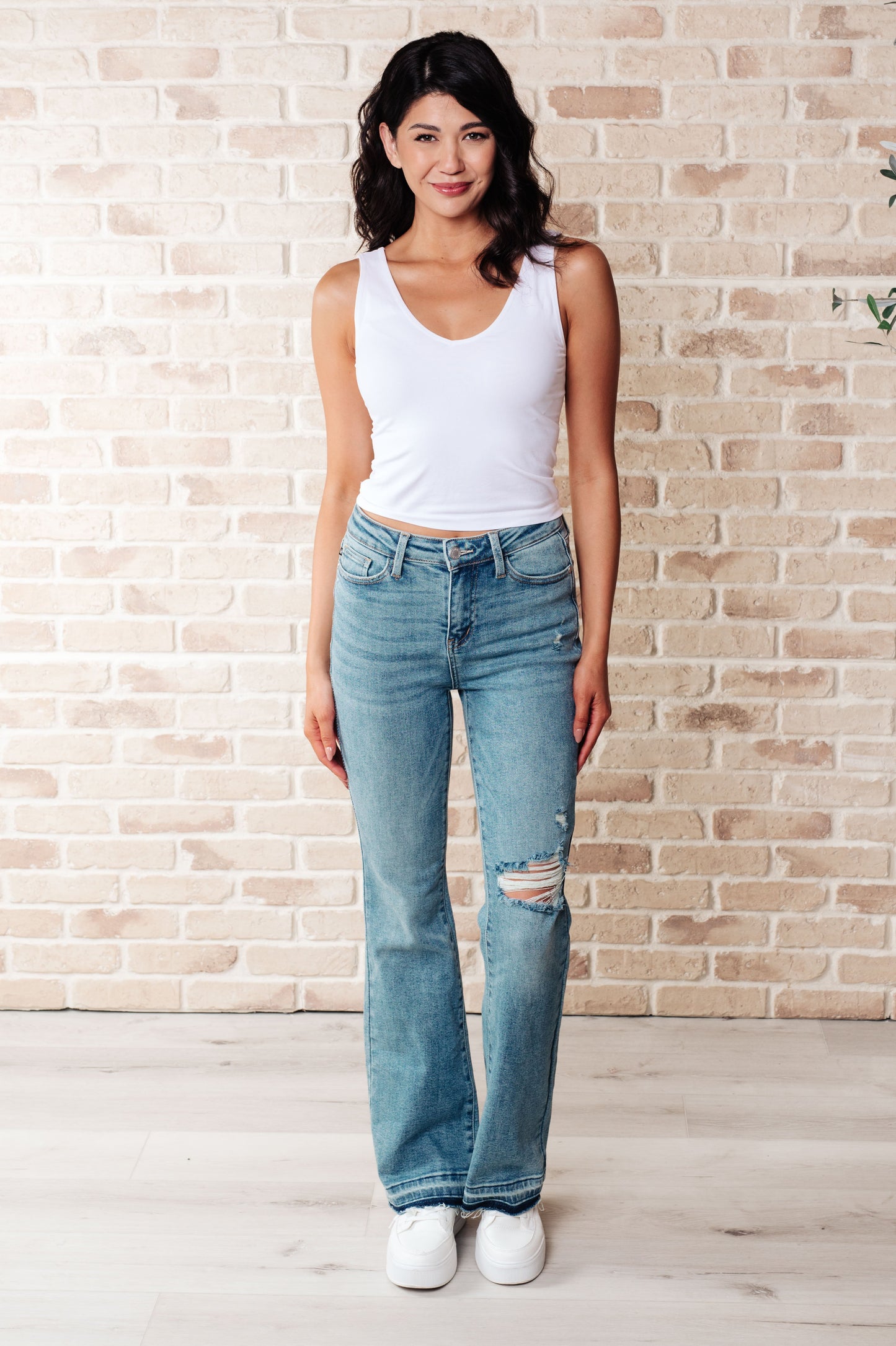 Isla Mid Rise Distressed Released Hem Bootcut Jeans MadreForte LLC