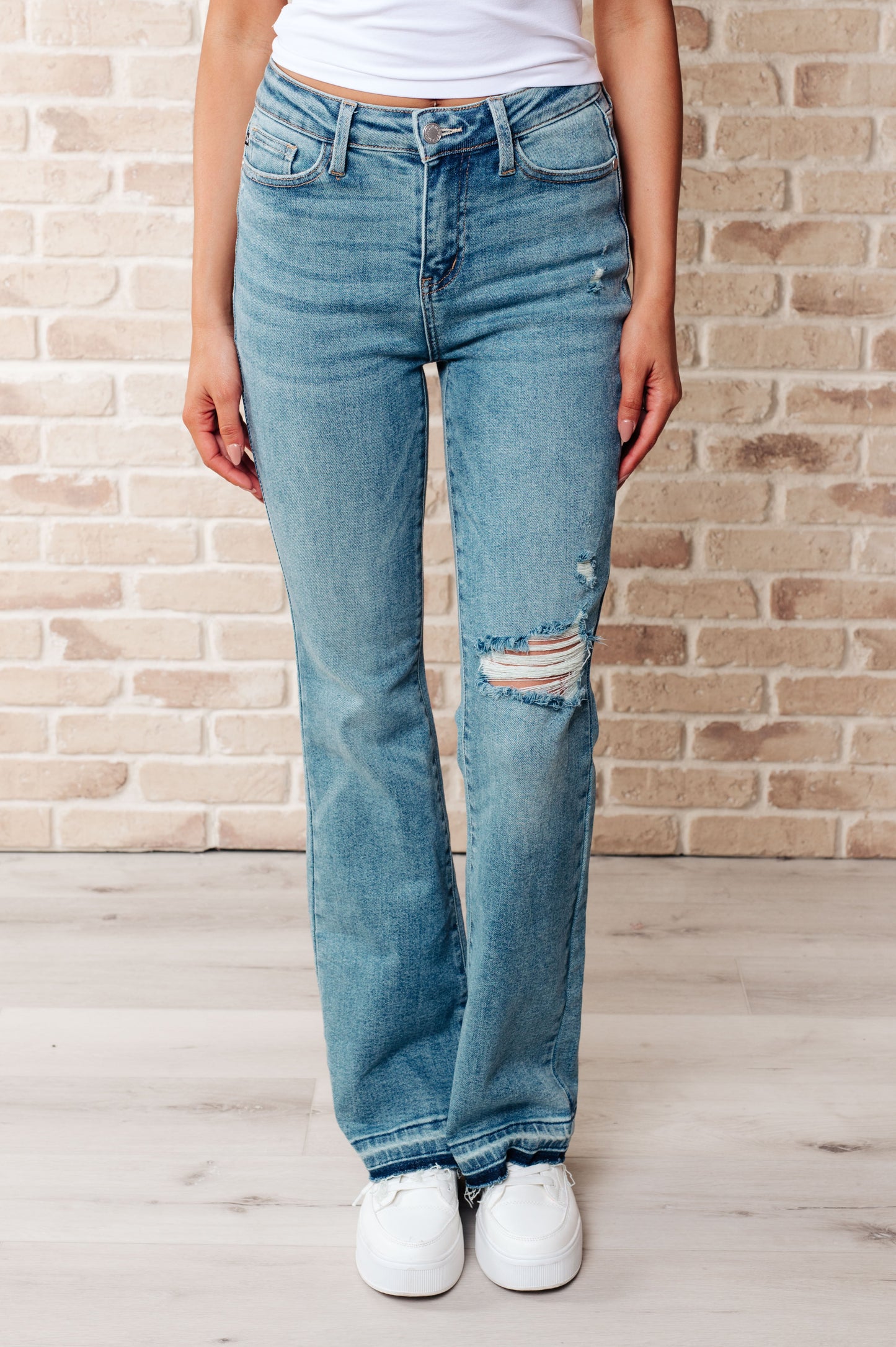 Isla Mid Rise Distressed Released Hem Bootcut Jeans MadreForte LLC