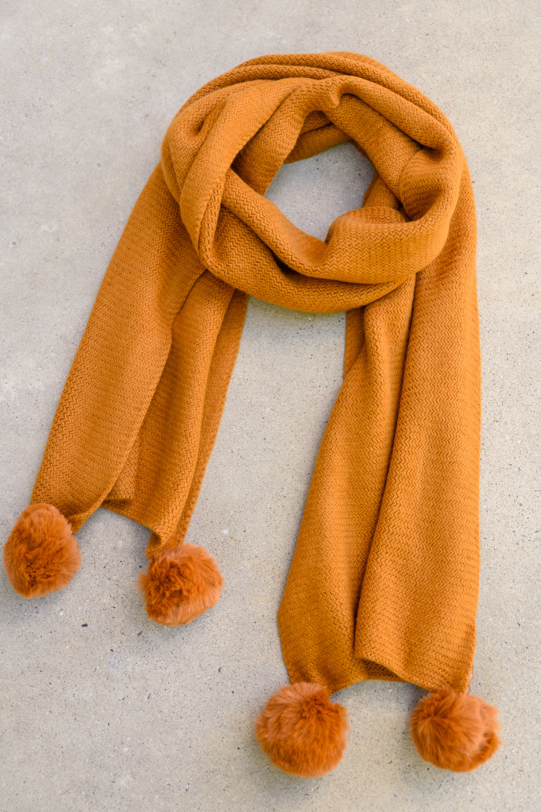 Knitted Fuzzy Pom Pom Scarf In Ginger MadreForte LLC